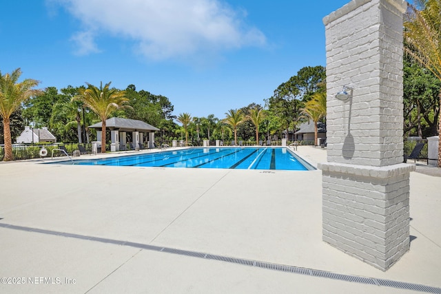 4583 Swilcan Bridge Ln N, Jacksonville, FL 32224 - pool featuring a patio and fence