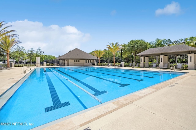 4583 Swilcan Bridge Ln N, Jacksonville, FL 32224 - community pool with a patio and fence