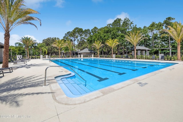 4583 Swilcan Bridge Ln N, Jacksonville, FL 32224 - community pool with fence and a patio