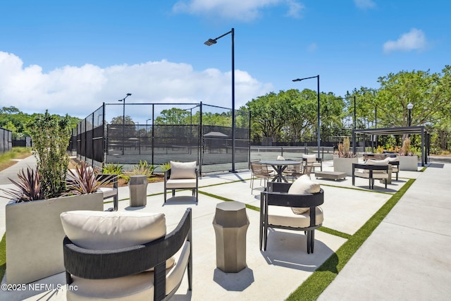 4583 Swilcan Bridge Ln N, Jacksonville, FL 32224 - view of home's community featuring fence and a tennis court