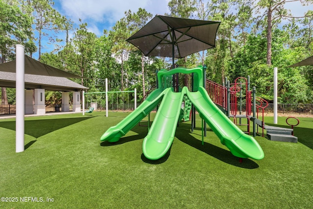 4583 Swilcan Bridge Ln N, Jacksonville, FL 32224 - community play area featuring fence and a lawn
