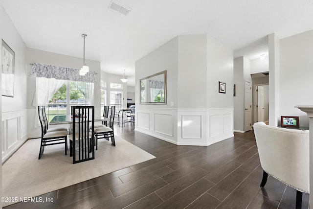 245 Village Green Ave, Fruit Cove, FL 32259 - dining area with dark wood finished floors, a decorative wall, a wainscoted wall, and visible vents