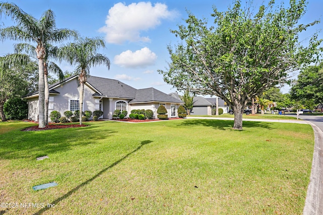 245 Village Green Ave, Fruit Cove, FL 32259 - ranch-style home with stucco siding and a front yard
