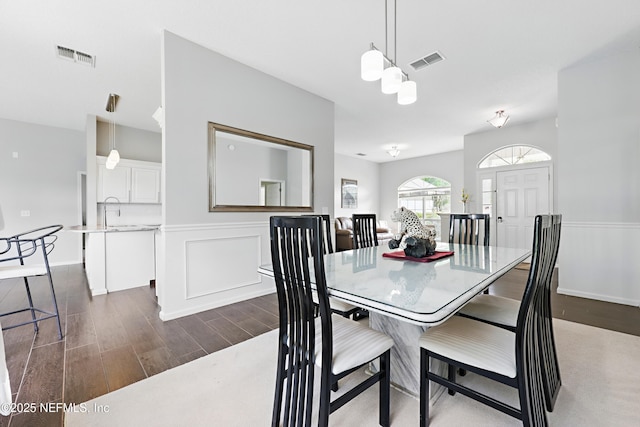 245 Village Green Ave, Fruit Cove, FL 32259 - dining room featuring baseboards, dark wood-type flooring, and visible vents