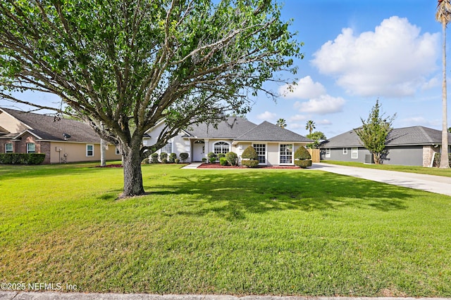245 Village Green Ave, Fruit Cove, FL 32259 - single story home featuring concrete driveway and a front lawn