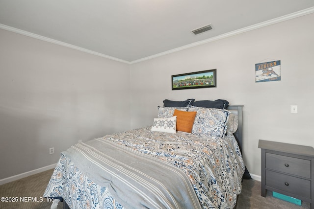 carpeted bedroom featuring crown molding, baseboards, and visible vents