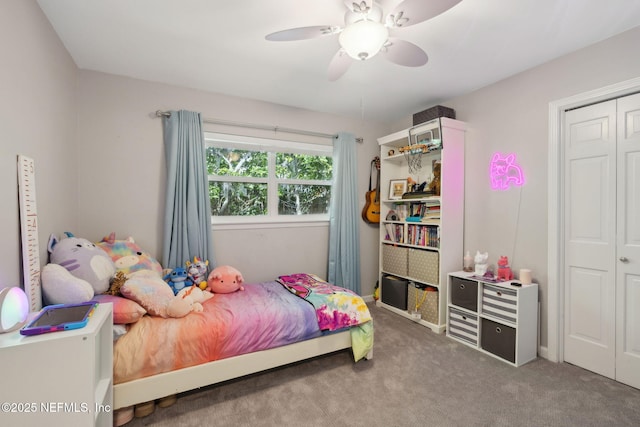 bedroom featuring ceiling fan and carpet flooring