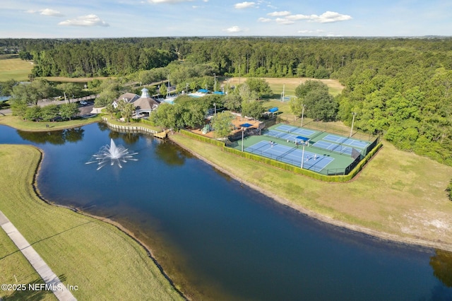 bird's eye view featuring a water view and a forest view