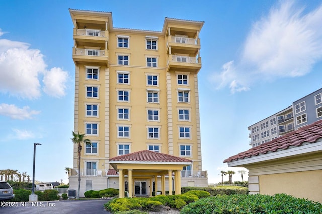 view of apartment building / complex featuring central air condition unit