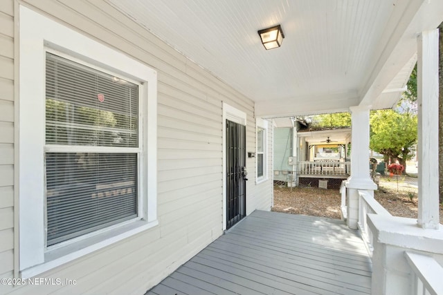 wooden terrace with covered porch