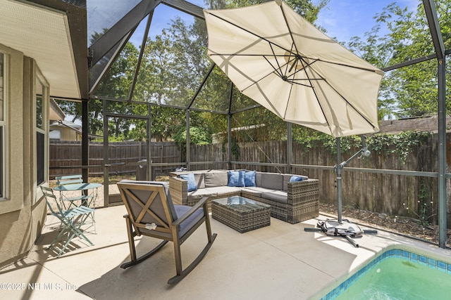 view of patio featuring a fenced backyard, a fenced in pool, an outdoor living space, and a lanai