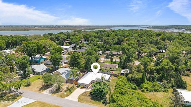 birds eye view of property with a water view and a residential view