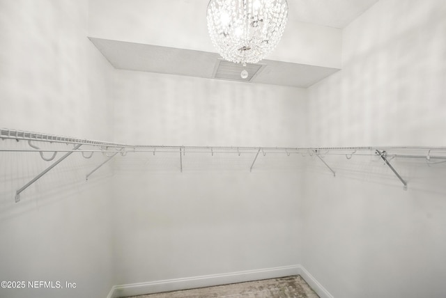 1431 Riverplace Blvd Unit 2003, Jacksonville, FL 32207 - walk in closet featuring a notable chandelier and visible vents