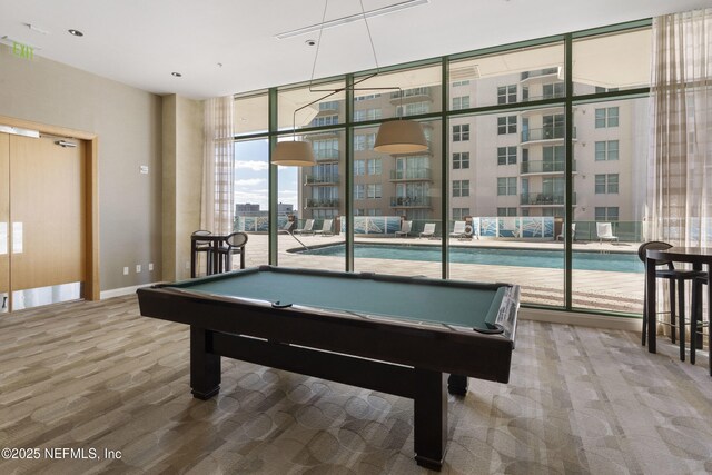 1431 Riverplace Blvd Unit 2003, Jacksonville, FL 32207 - game room with floor to ceiling windows, baseboards, carpet flooring, and pool table
