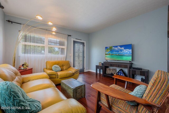 573 Oleander St, Neptune Beach, FL 32266 - living room featuring wood finished floors and baseboards