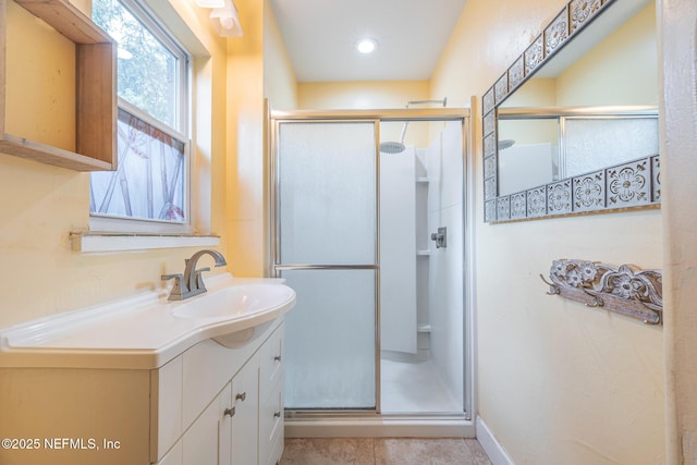 573 Oleander St, Neptune Beach, FL 32266 - bathroom with a stall shower, vanity, and recessed lighting
