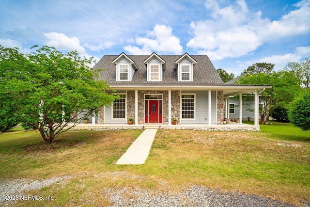 view of front of house with a porch, a front lawn, and stone siding