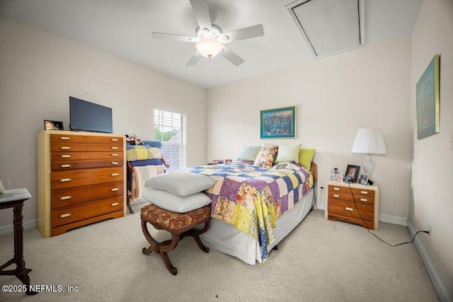 bedroom featuring attic access, a ceiling fan, light carpet, and baseboards