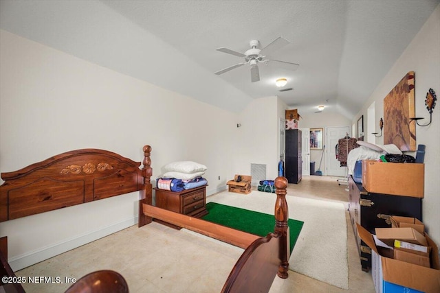 bedroom featuring visible vents, ceiling fan, lofted ceiling, and baseboards