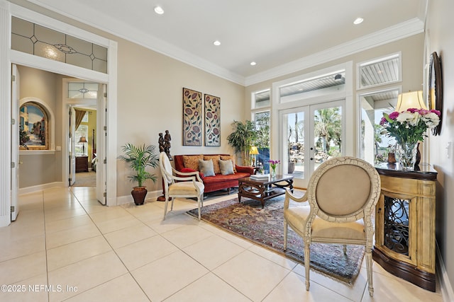 living area featuring recessed lighting, light tile patterned floors, baseboards, french doors, and crown molding