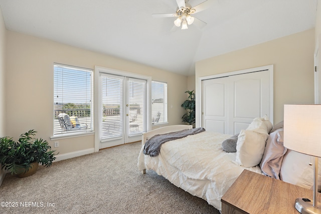 bedroom with access to exterior, a closet, baseboards, vaulted ceiling, and carpet