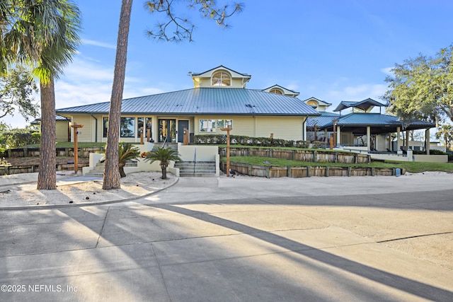 view of front of property featuring metal roof