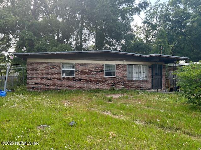 view of property exterior featuring brick siding