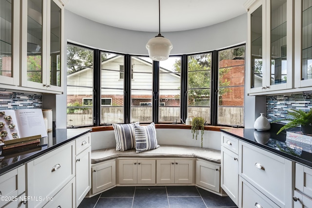 interior space with dark tile patterned floors