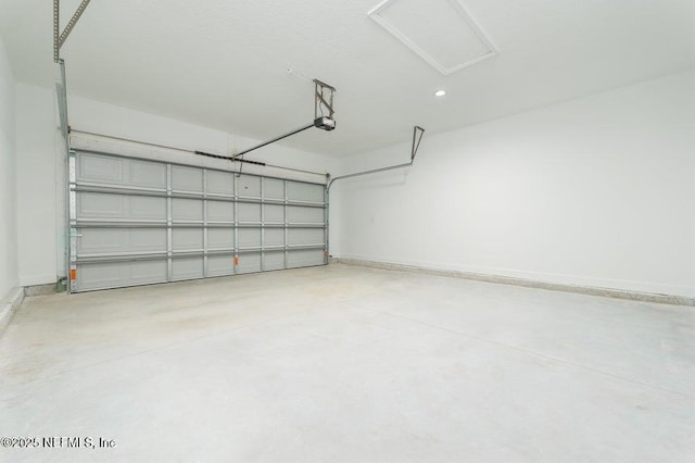 5817 Silver Sands Cir, Keystone Heights, FL 32656 - garage with recessed lighting, baseboards, and a garage door opener