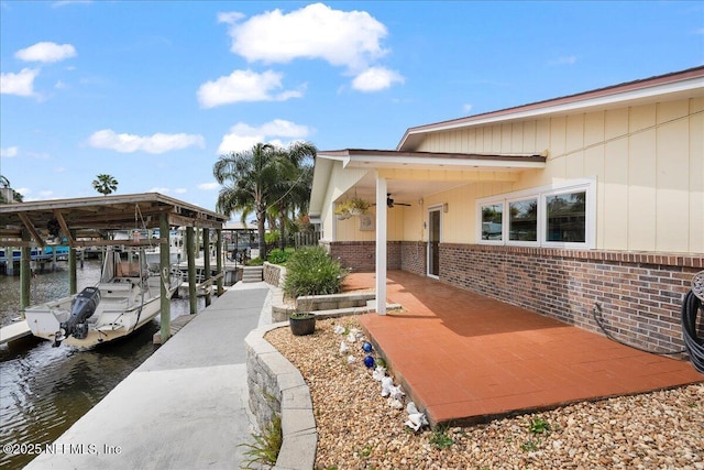 4201 San Pablo Rd S, Jacksonville, FL 32224 - view of home's community featuring a water view, boat lift, and a dock