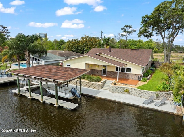 4201 San Pablo Rd S, Jacksonville, FL 32224 - view of dock with boat lift and a water view