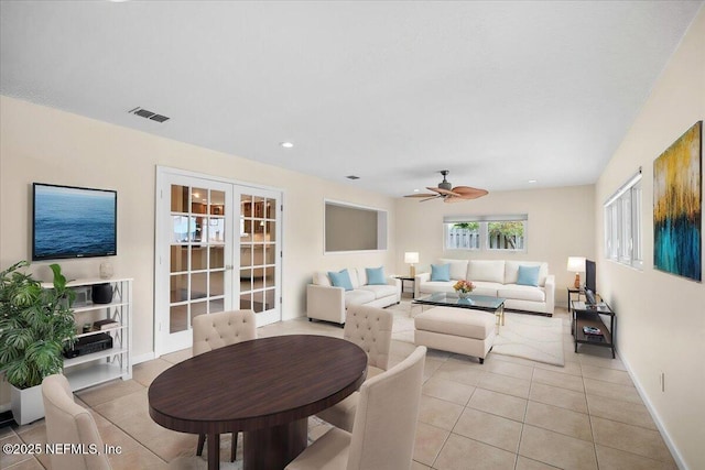 4201 San Pablo Rd S, Jacksonville, FL 32224 - living room with french doors, a ceiling fan, baseboards, light tile patterned floors, and visible vents