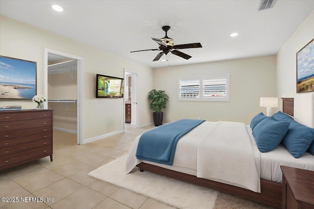 4201 San Pablo Rd S, Jacksonville, FL 32224 - bedroom with a walk in closet, recessed lighting, light tile patterned flooring, and visible vents