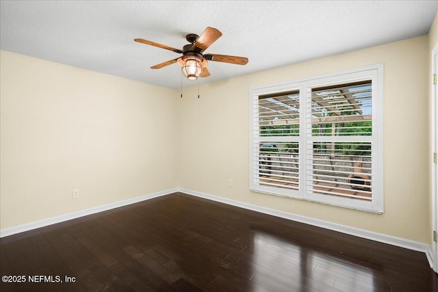 4201 San Pablo Rd S, Jacksonville, FL 32224 - unfurnished room with dark wood-type flooring, a ceiling fan, baseboards, and a textured ceiling