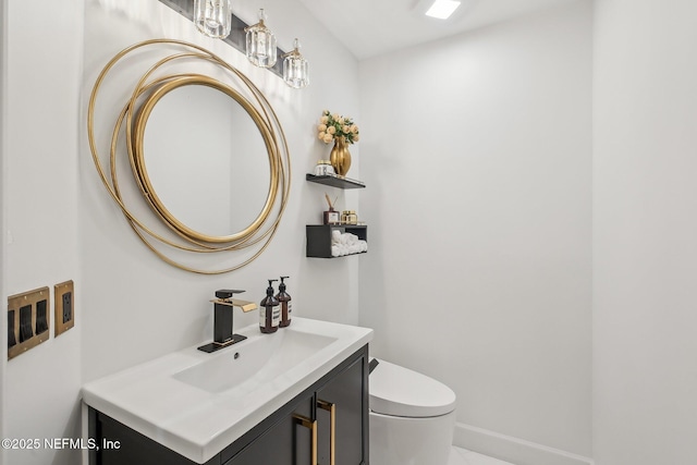 116 Lost Beach Ln, Ponte Vedra Beach, FL 32082 - bathroom featuring vanity, baseboards, and toilet