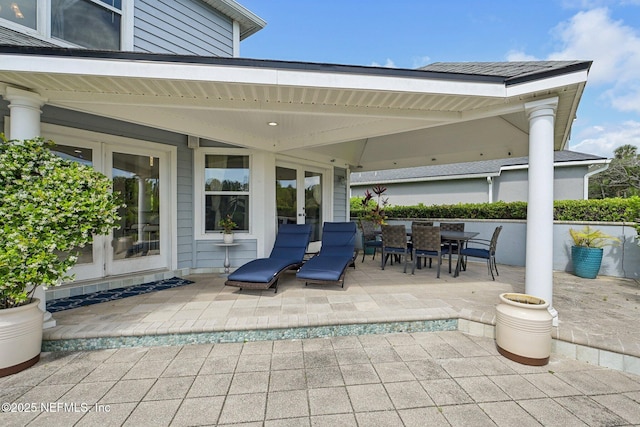 116 Lost Beach Ln, Ponte Vedra Beach, FL 32082 - view of patio featuring french doors and outdoor dining space