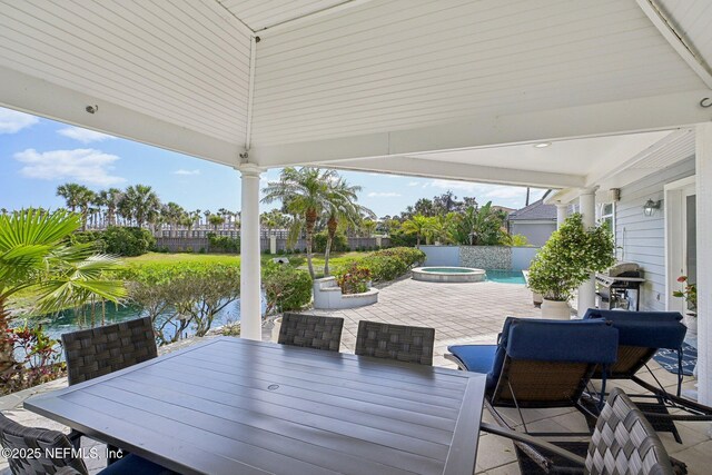 116 Lost Beach Ln, Ponte Vedra Beach, FL 32082 - wooden terrace featuring grilling area, outdoor dining space, a pool with connected hot tub, and a patio area