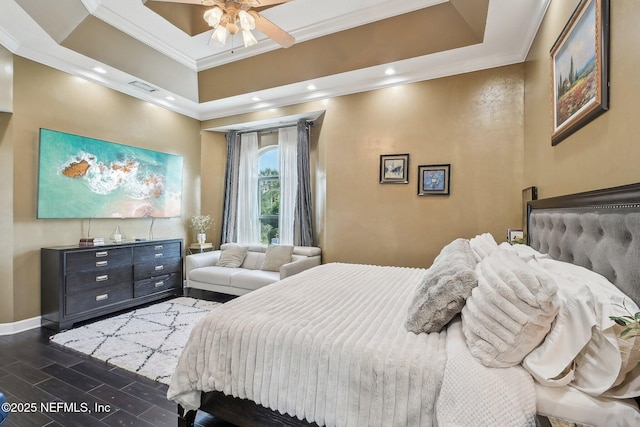116 Lost Beach Ln, Ponte Vedra Beach, FL 32082 - bedroom with visible vents, crown molding, dark wood finished floors, baseboards, and a tray ceiling