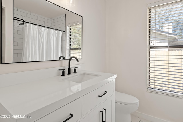 1625 Panther Ridge Ct, Jacksonville, FL 32225 - bathroom featuring a wealth of natural light, vanity, and baseboards