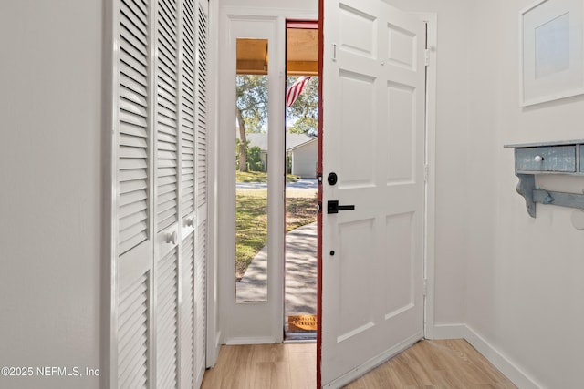 1625 Panther Ridge Ct, Jacksonville, FL 32225 - doorway featuring baseboards and light wood-type flooring