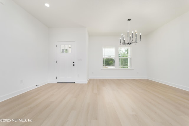 295 SE 57th St, Keystone Heights, FL 32656 - entryway featuring a chandelier, light wood finished floors, baseboards, and recessed lighting