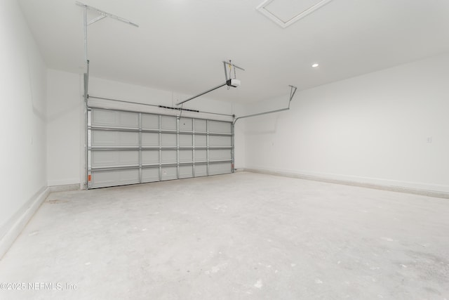 295 SE 57th St, Keystone Heights, FL 32656 - garage with a garage door opener and baseboards