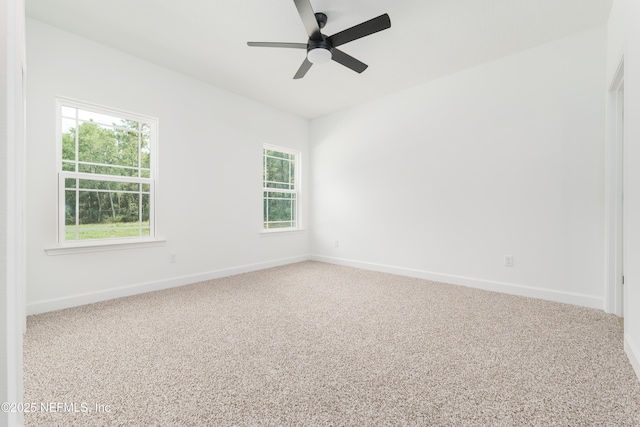 295 SE 57th St, Keystone Heights, FL 32656 - unfurnished room with a ceiling fan, baseboards, and carpet floors