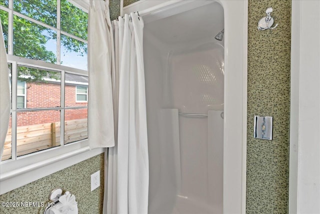 4379 San Jose Blvd, Jacksonville, FL 32207 - full bath with wallpapered walls and a shower with shower curtain