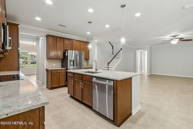 124 Sarah Elizabeth Dr, Saint Johns, FL 32259 - kitchen with a sink, crown molding, visible vents, ceiling fan, and appliances with stainless steel finishes