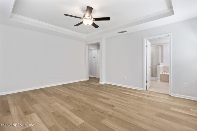 124 Sarah Elizabeth Dr, Saint Johns, FL 32259 - unfurnished bedroom featuring crown molding, a tray ceiling, and visible vents