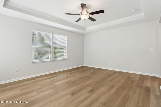 124 Sarah Elizabeth Dr, Saint Johns, FL 32259 - empty room featuring a tray ceiling, crown molding, and ceiling fan