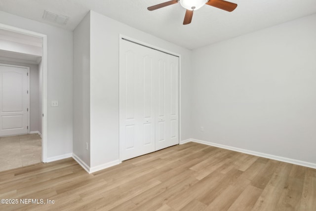 124 Sarah Elizabeth Dr, Saint Johns, FL 32259 - unfurnished bedroom with baseboards, a closet, light wood finished floors, and visible vents