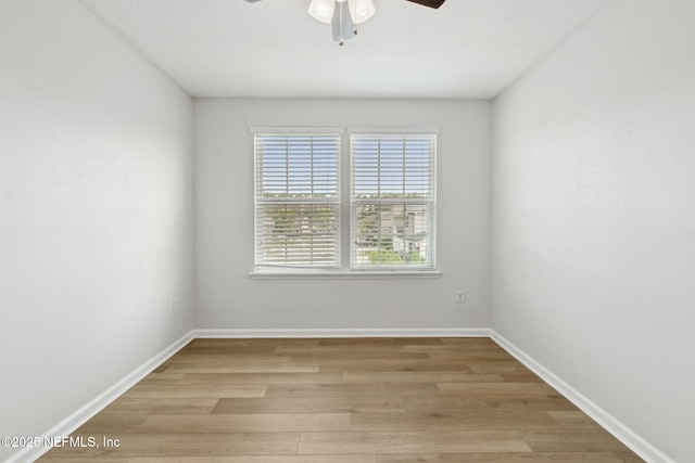 124 Sarah Elizabeth Dr, Saint Johns, FL 32259 - empty room with baseboards, light wood-style floors, and ceiling fan
