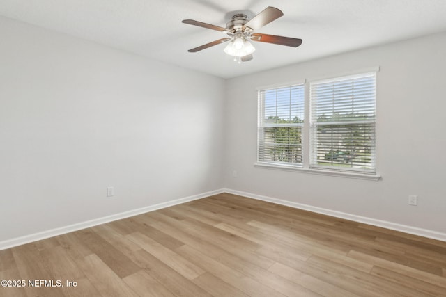 124 Sarah Elizabeth Dr, Saint Johns, FL 32259 - empty room featuring baseboards, light wood-type flooring, and a ceiling fan